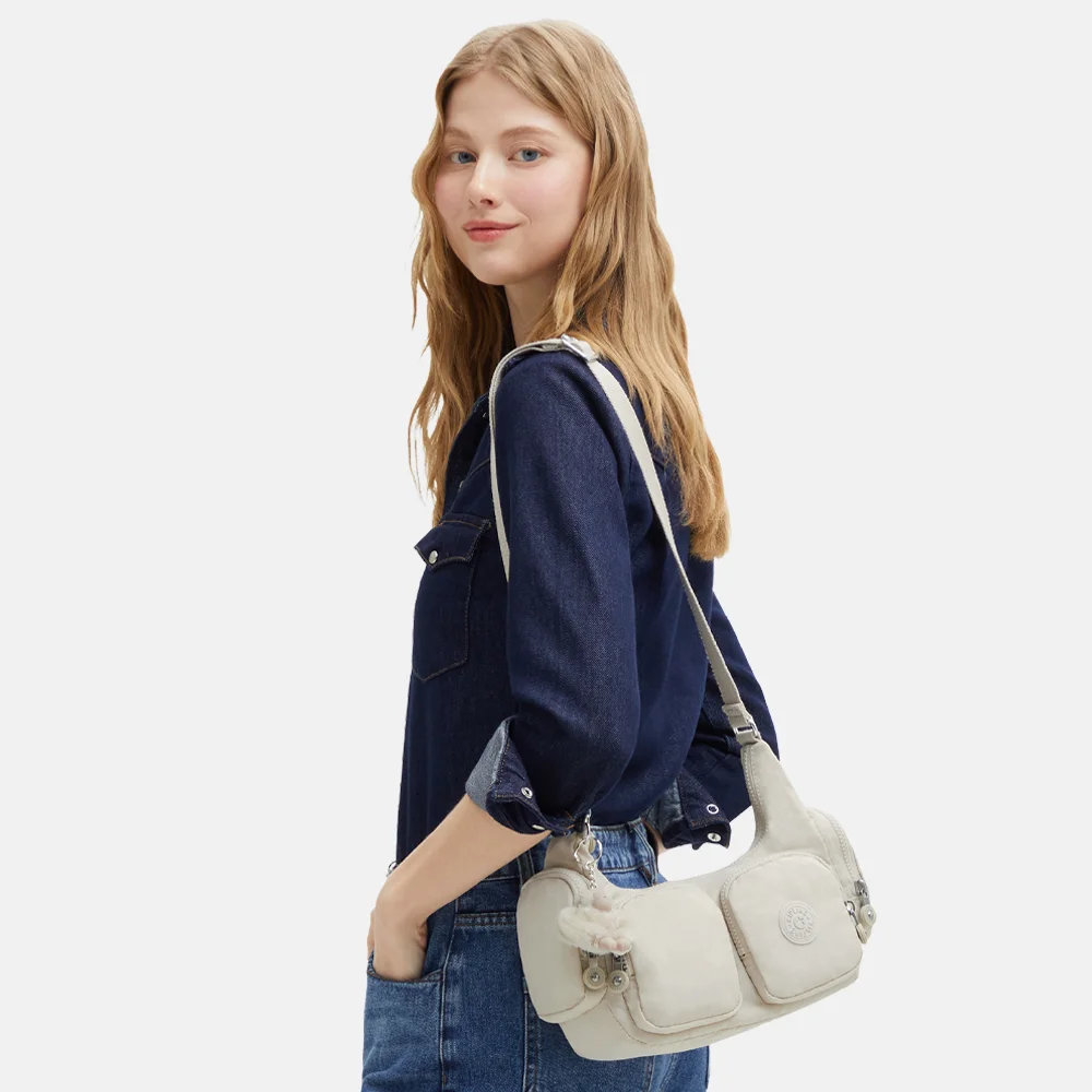 Kipling Rikka crossbody tas S hideaway beige bij Duifhuizen