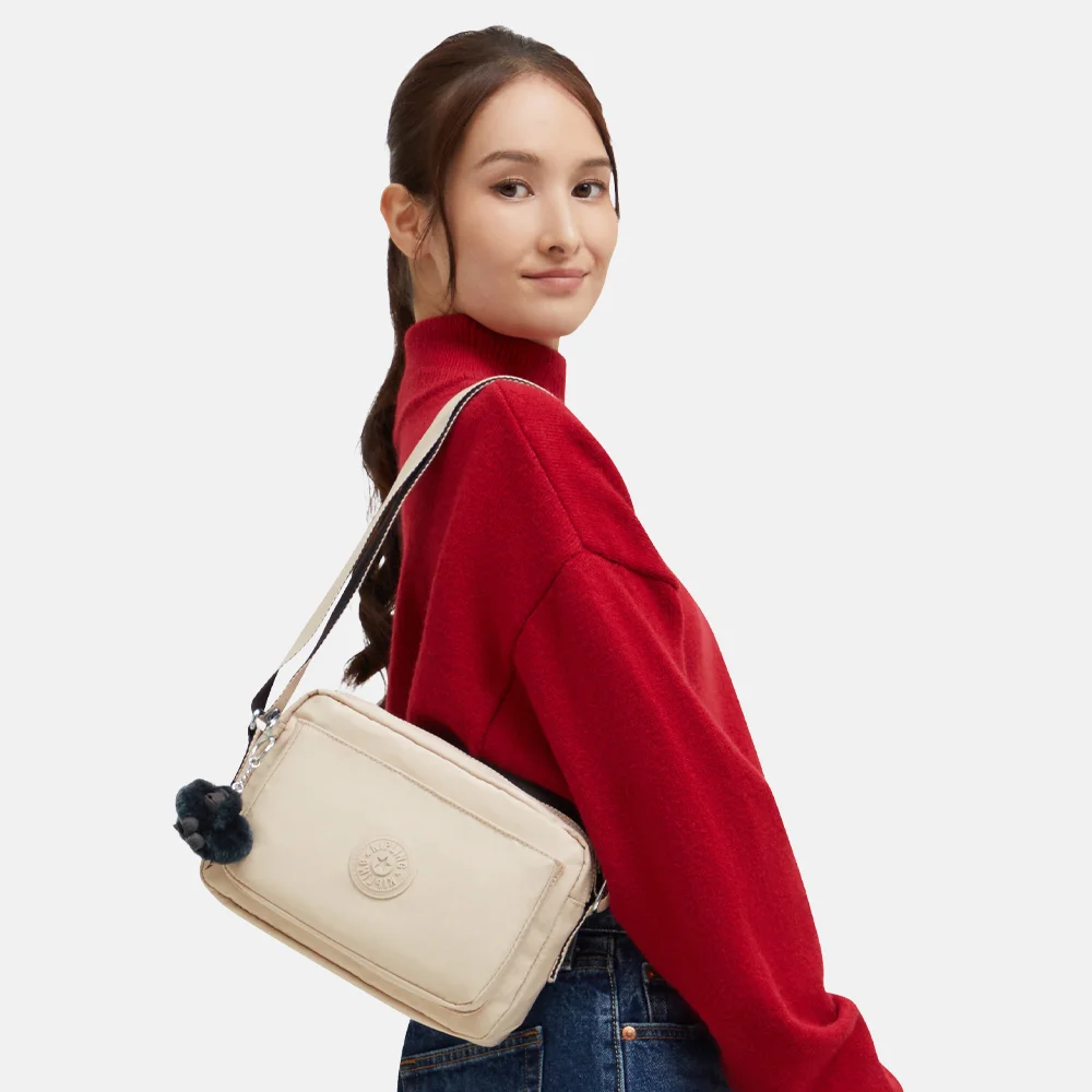 Kipling Abanu crossbody tas M back to beige bij Duifhuizen